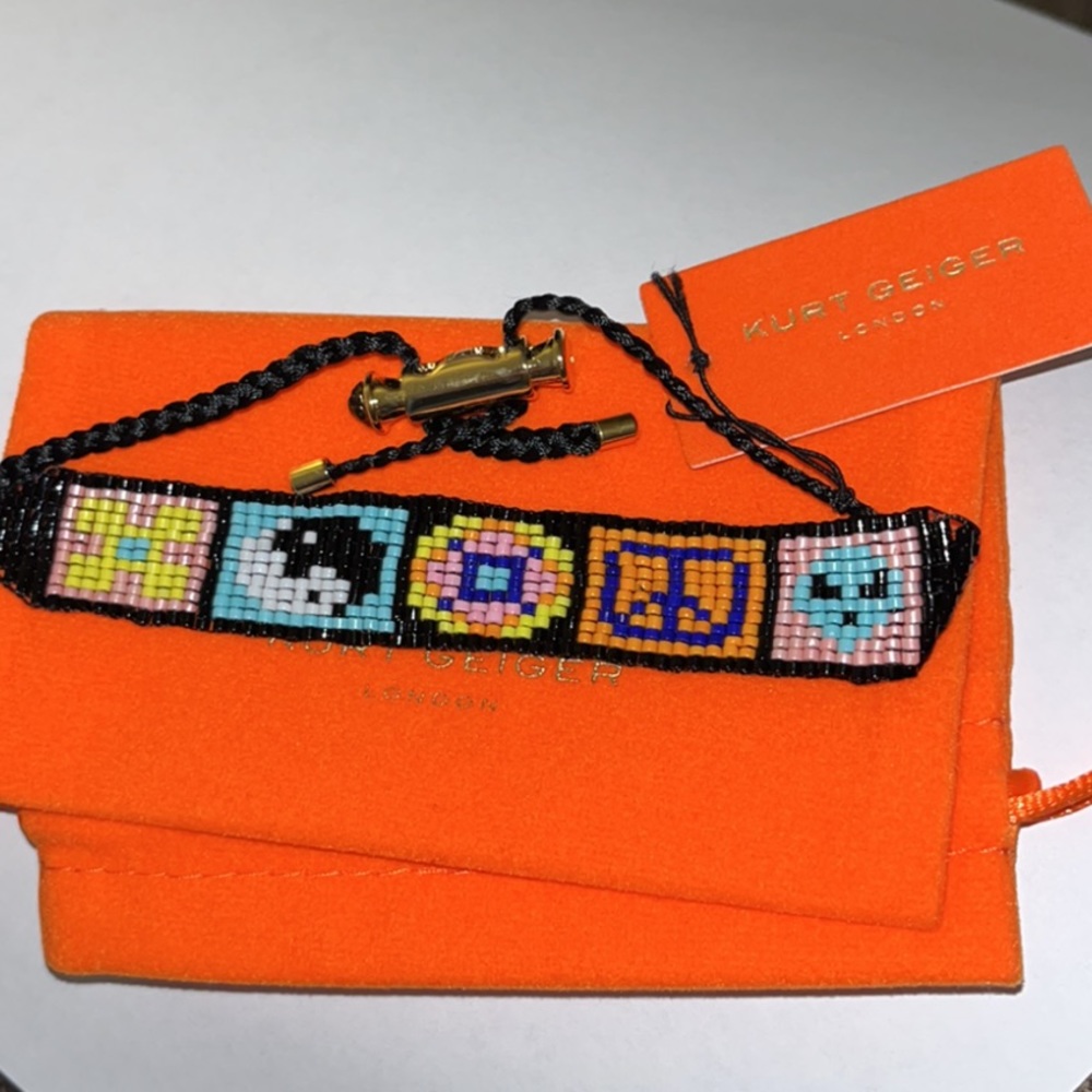 KURT GEIGER Beaded Bracelet. NWT peace sign, alien, yin yang black blue yellow